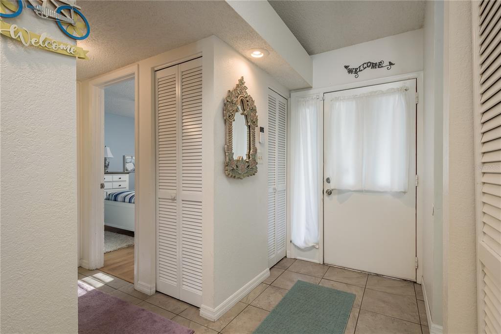 102 Anclote Road Tarpon Springs, FL 34689 - Photo 5 of 42 a view of a hallway with closet and bathroom