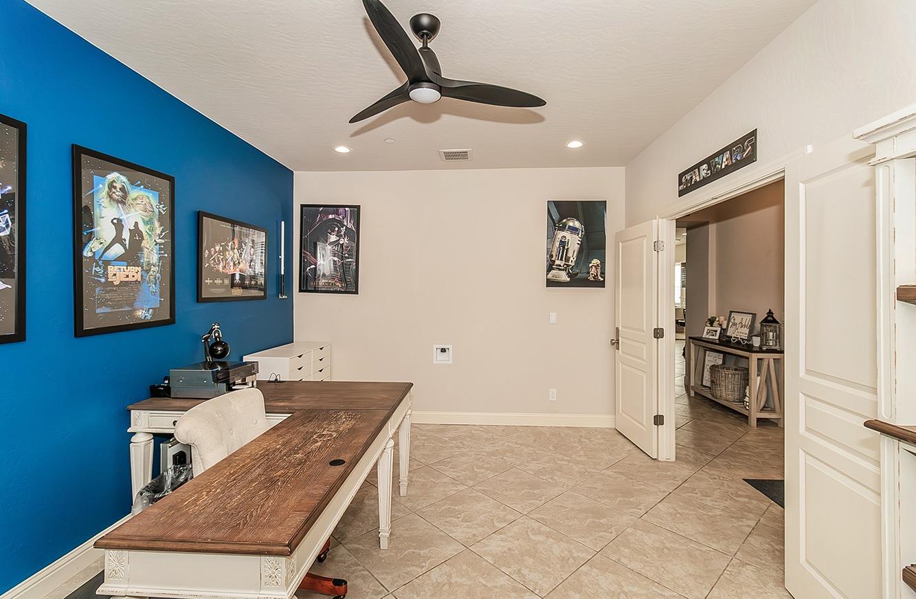 1035 Agua Dulce Avenue Clovis, CA 93619 - Photo 12 of 40 a living room with stainless steel appliances furniture a rug and a view of kitchen