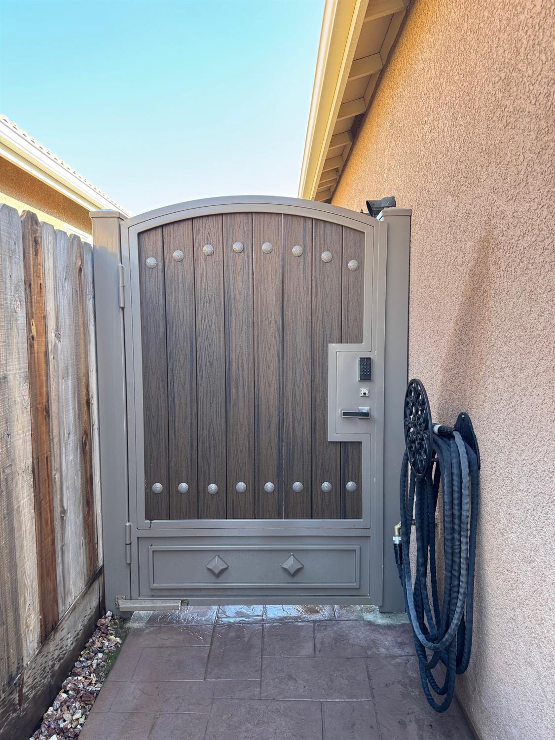 1035 Agua Dulce Avenue Clovis, CA 93619 - Photo 31 of 40 a view of walk in closet with clothes and shoes