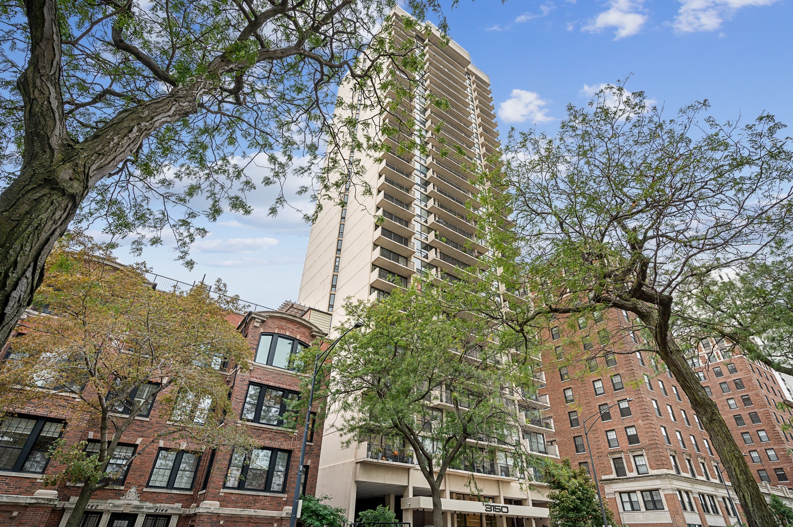 a view of a city with tall buildings