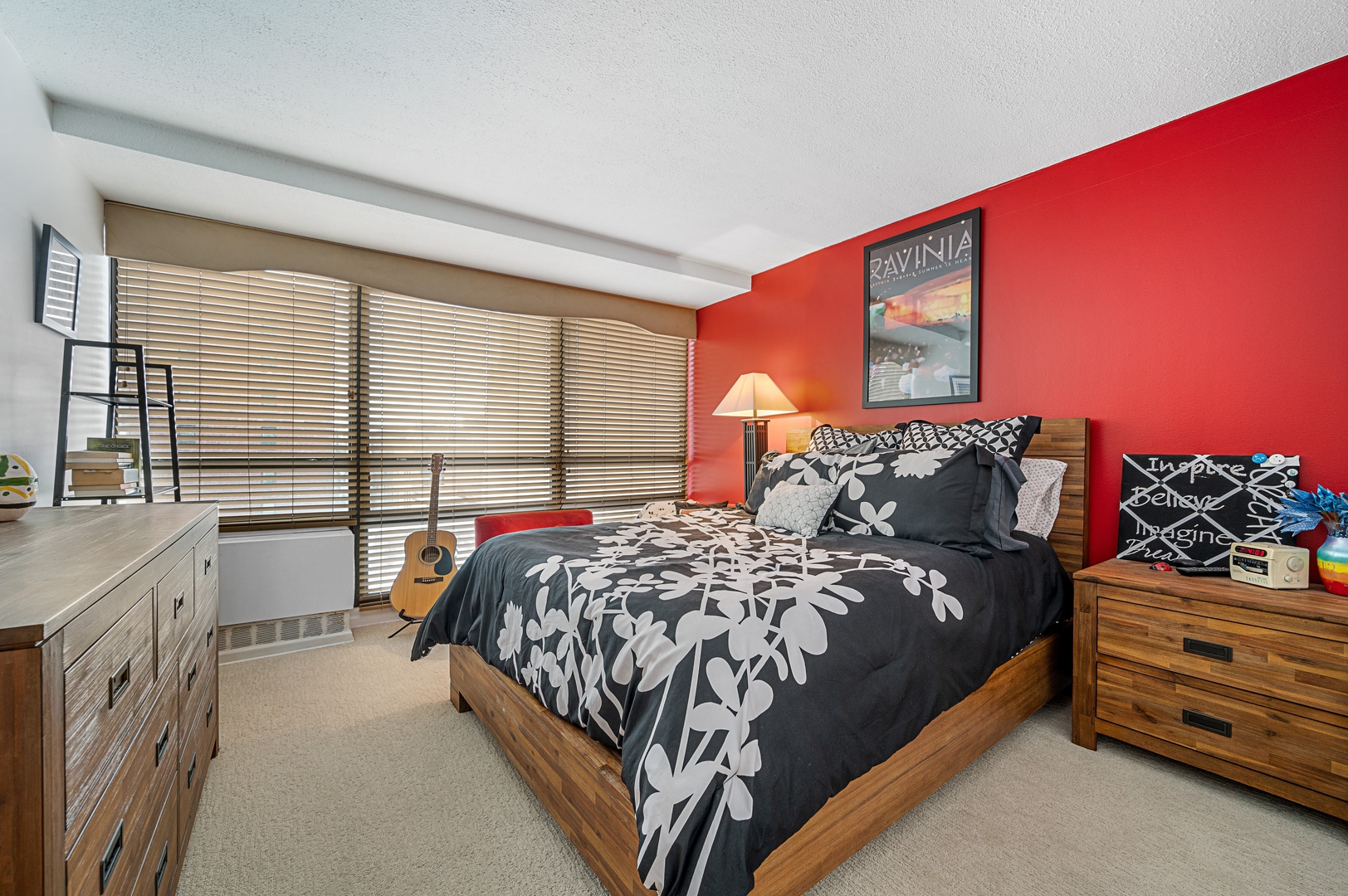 3150 North Sheridan Road, Unit 3C Chicago, IL 60657 - Photo 14 of 19 a bed sitting in a bedroom next to a window