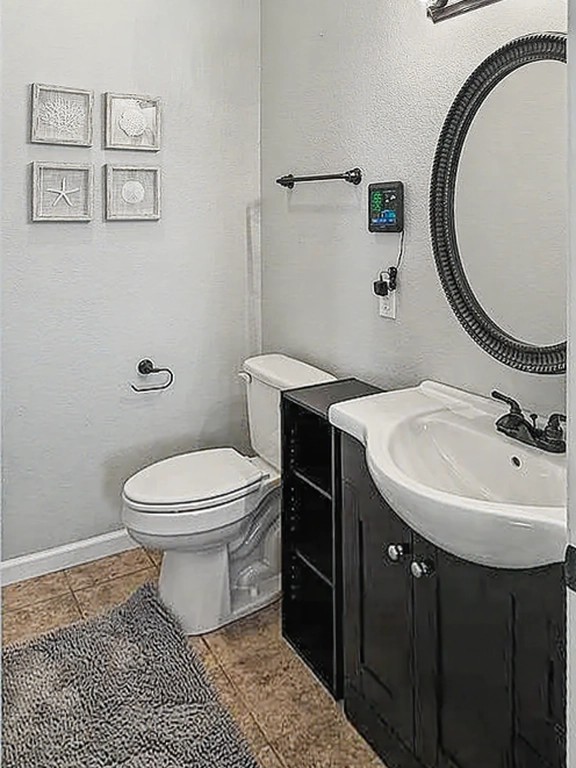 175 Ellen Lane Decaturville, TN 38329 - Photo 23 of 25 a bathroom with a sink toilet and a mirror