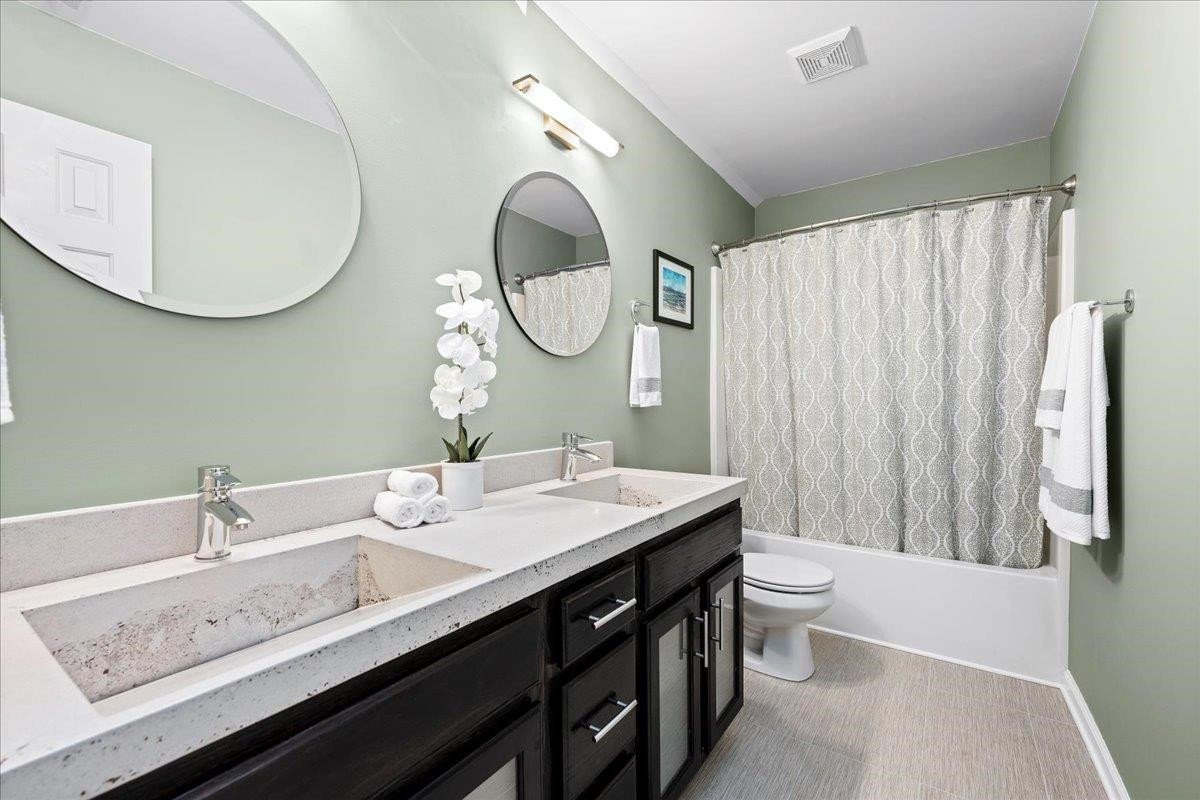 1441 Tawny View Lane Raleigh, NC 27603 - Photo 22 of 30 Second floor bathroom with two sinks