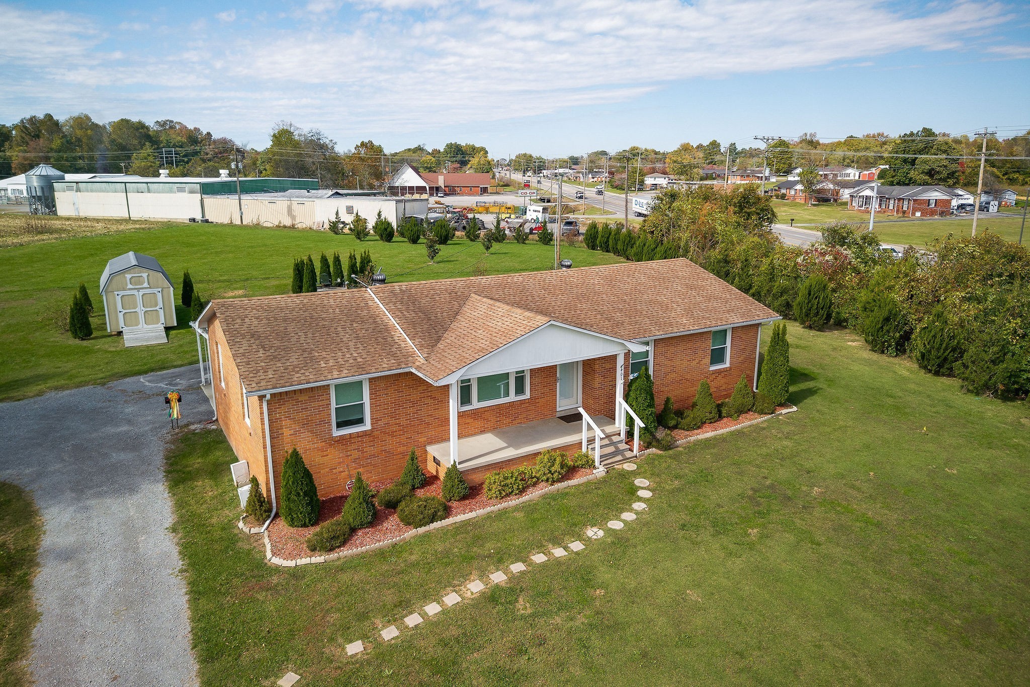401 Whaley Street Smithville, TN 37166 - Photo 2 of 37 an aerial view of a house with outdoor space and lake view in back