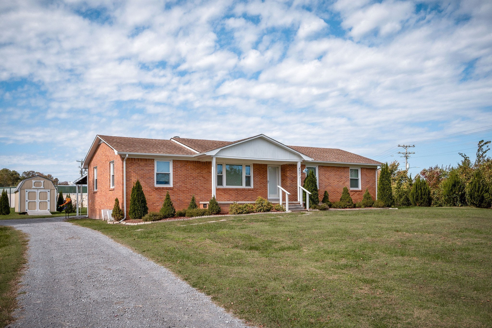 401 Whaley Street Smithville, TN 37166 - Photo 26 of 37 a front view of a house with a yard