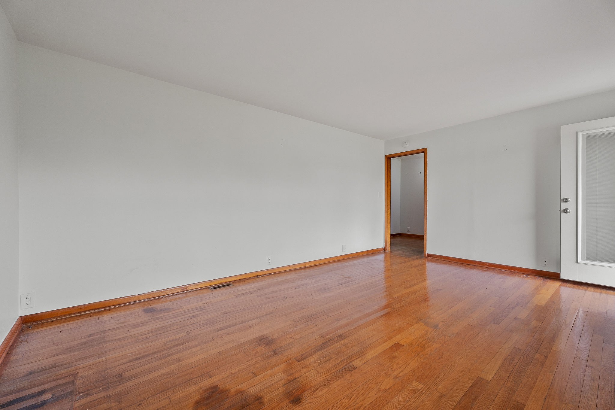 401 Whaley Street Smithville, TN 37166 - Photo 10 of 37 a view of an empty room with wooden floor and closet