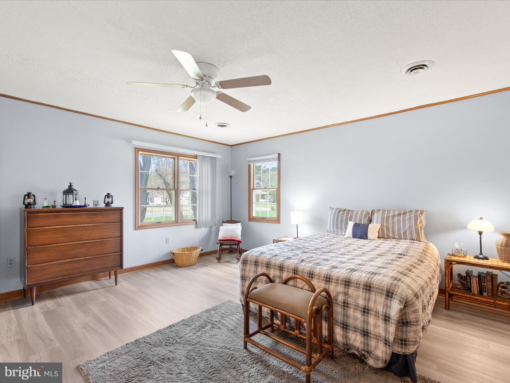 23451 Deal Island Road Deal Island, MD 21821 - Photo 23 of 49 a bedroom with a bed and window