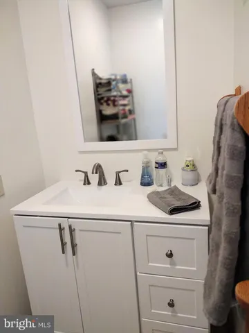 a bathroom with a sink and a vanity
