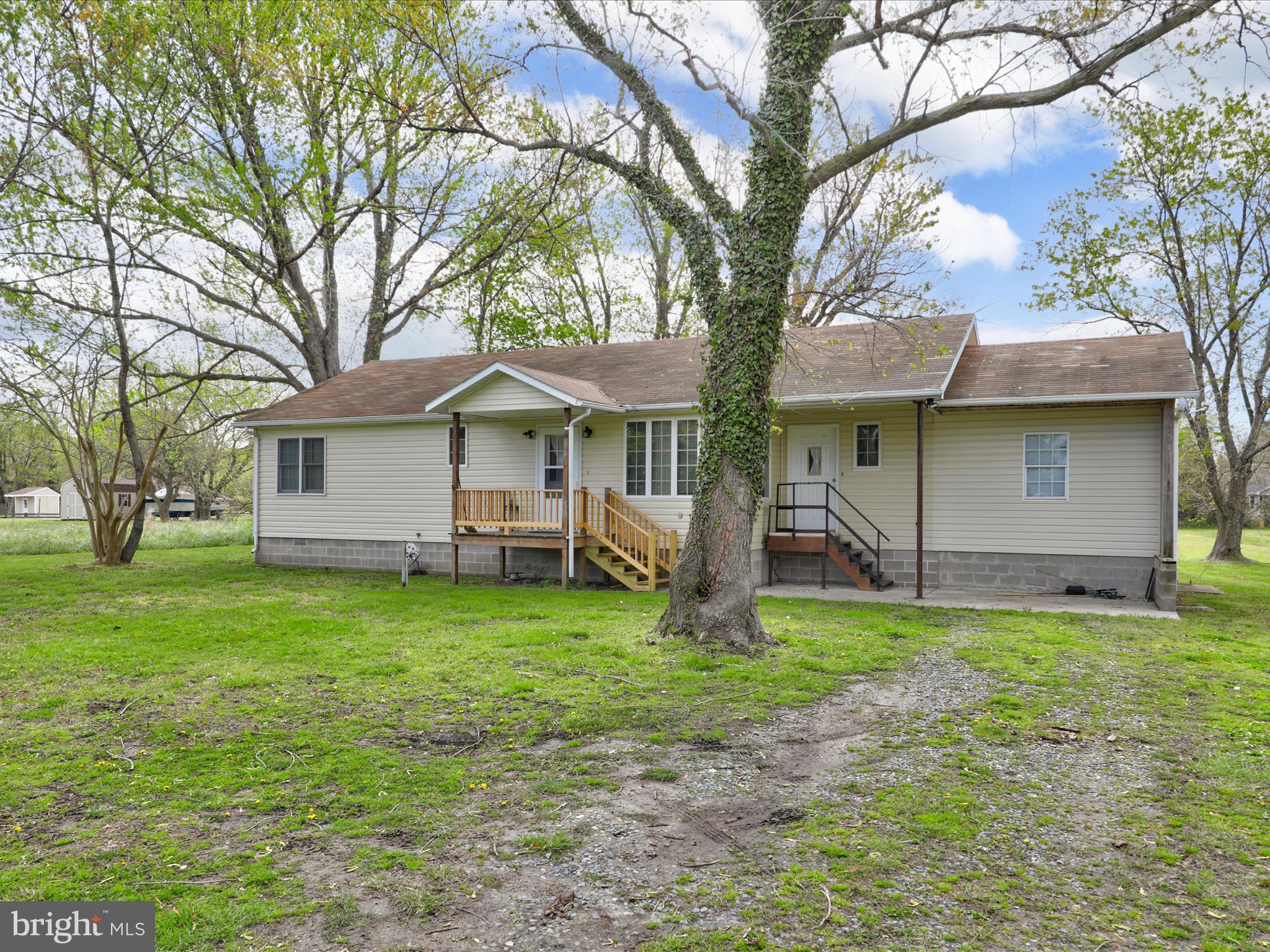 23451 Deal Island Road Deal Island, MD 21821 - Photo 4 of 49 a view of a house with a yard