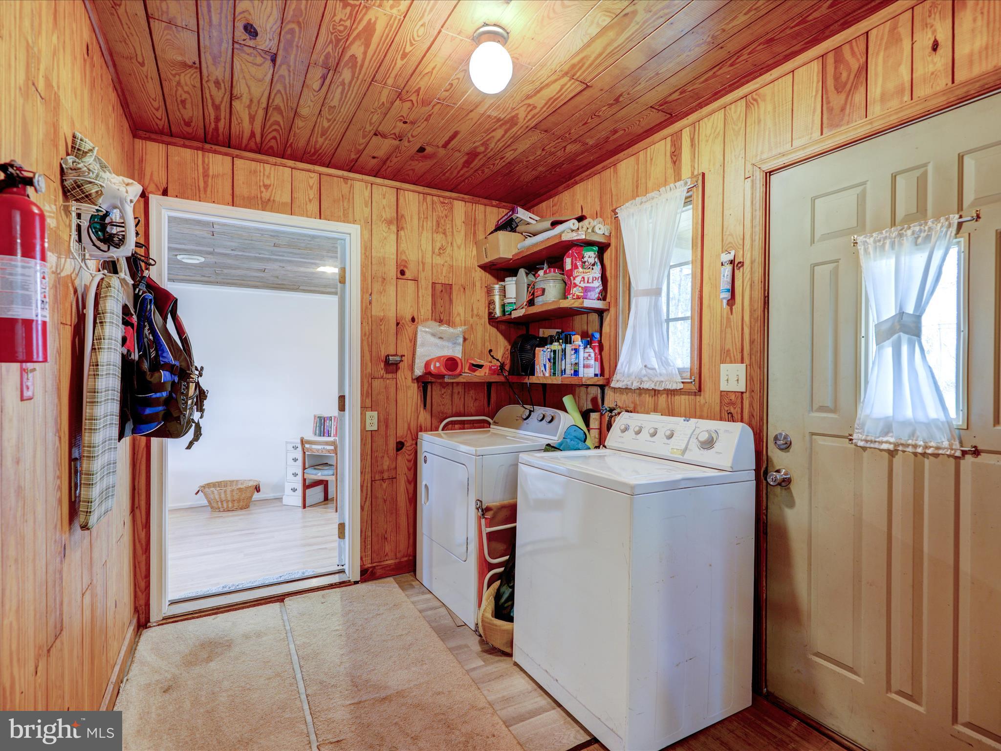 23451 Deal Island Road Deal Island, MD 21821 - Photo 41 of 49 a utility room with dryer and washer