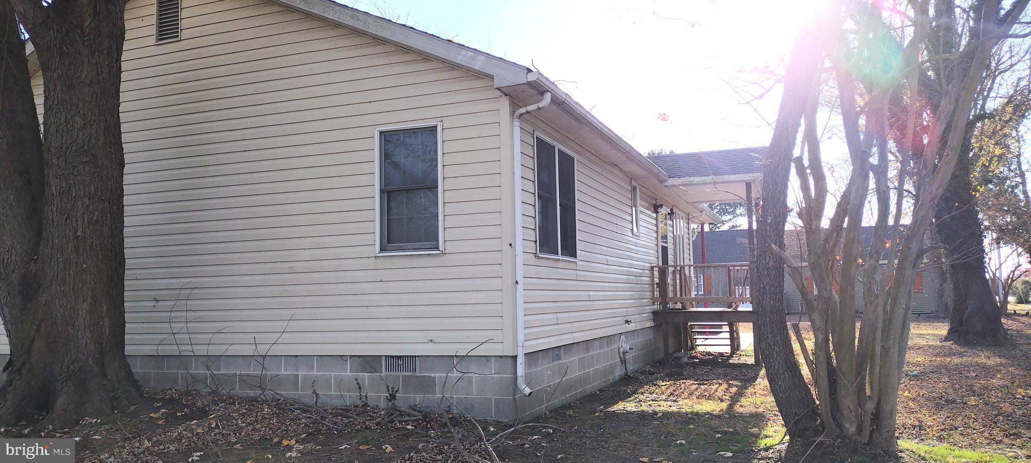 23451 Deal Island Road Deal Island, MD 21821 - Photo 45 of 49 a view of a house with a yard