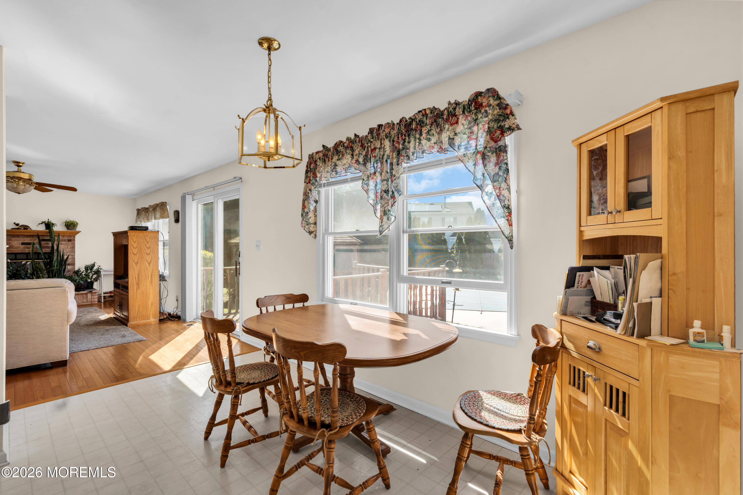 1 Wendy Court Jackson, NJ 08527 - Photo 12 of 33 a view of a dining room with furniture window and wooden floor
