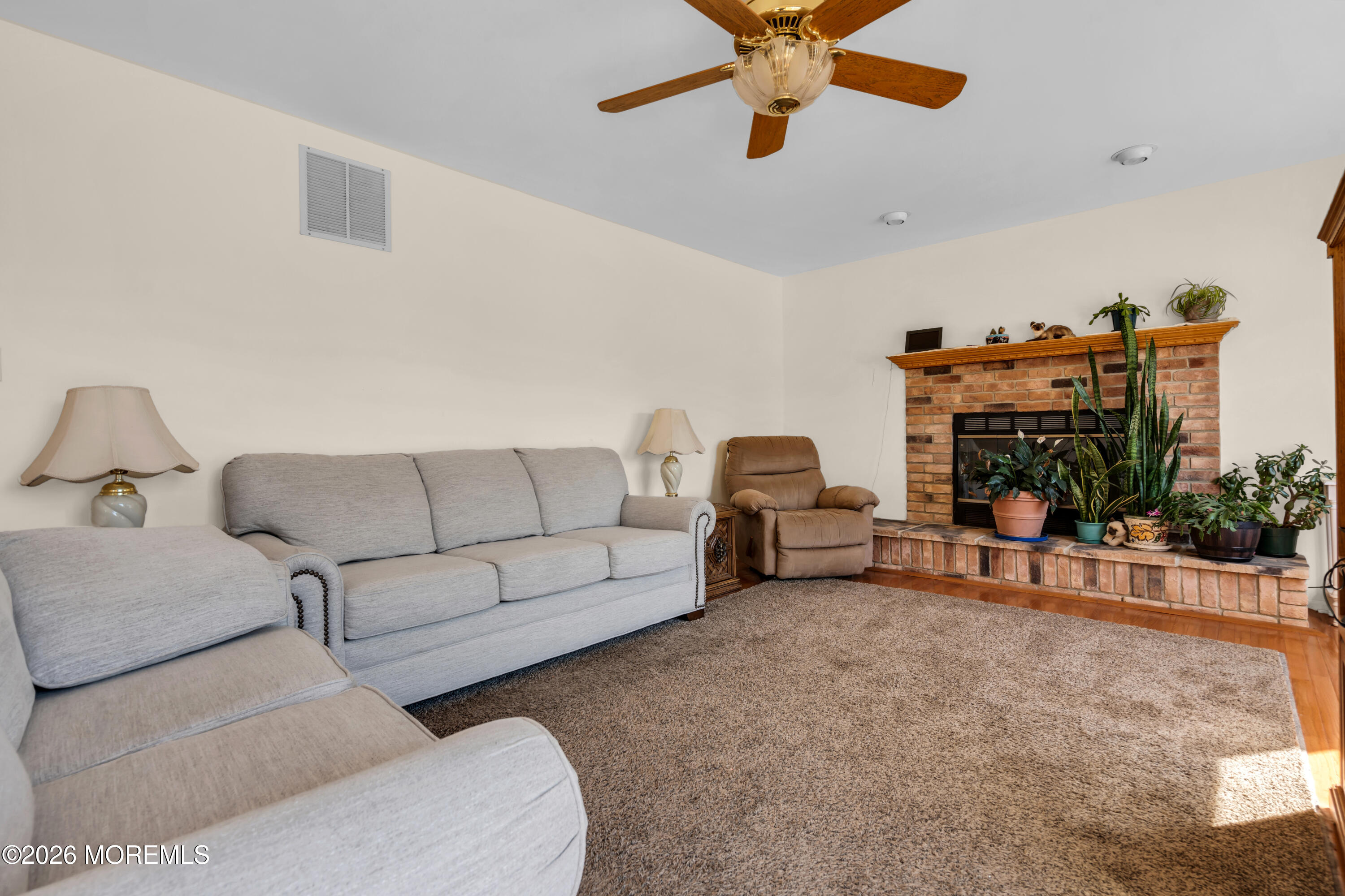 1 Wendy Court Jackson, NJ 08527 - Photo 14 of 33 a living room with furniture and a fireplace