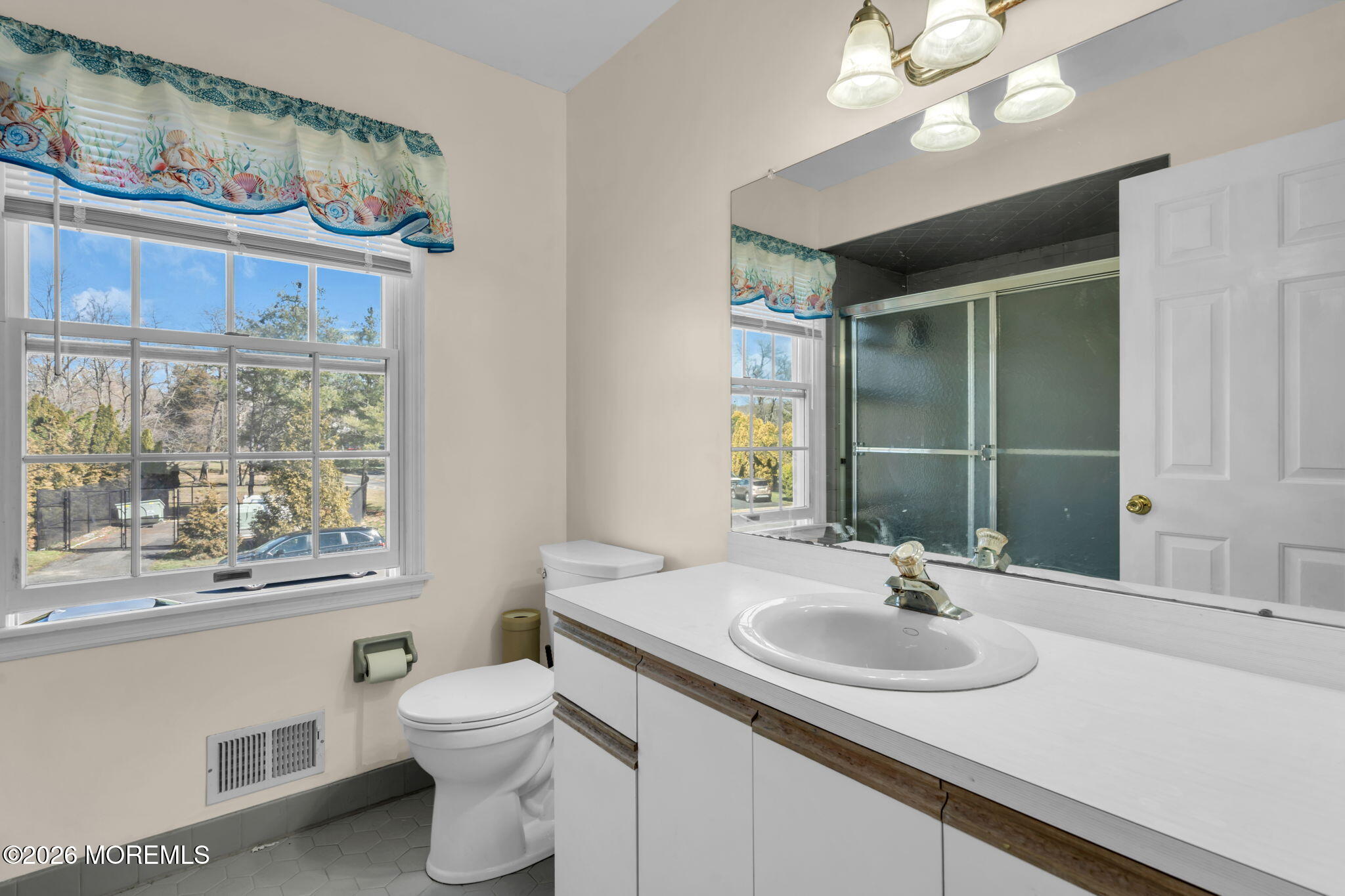 1 Wendy Court Jackson, NJ 08527 - Photo 19 of 33 a bathroom with a sink a toilet and a mirror