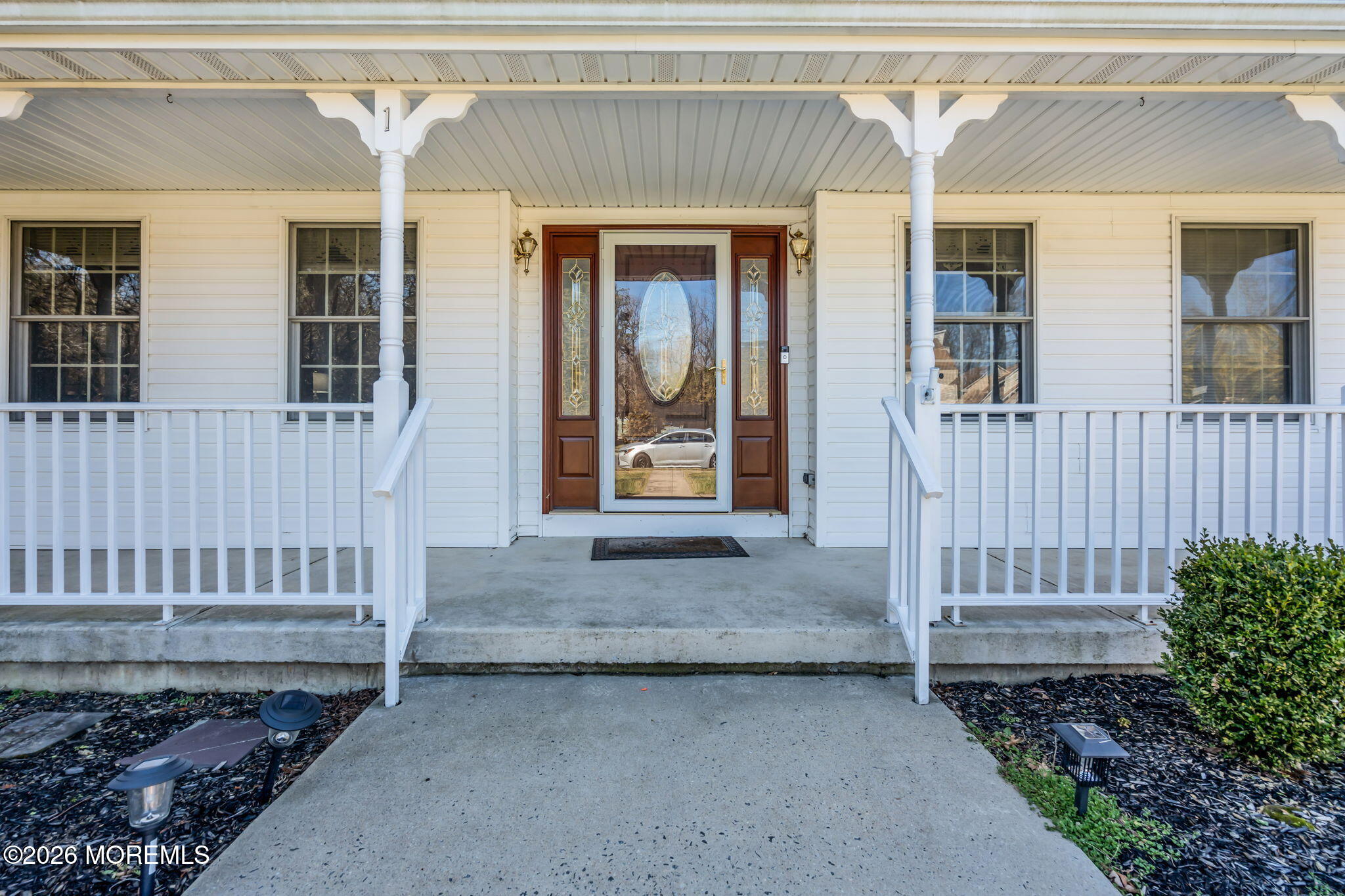 1 Wendy Court Jackson, NJ 08527 - Photo 2 of 33 a view of a porch with a bench