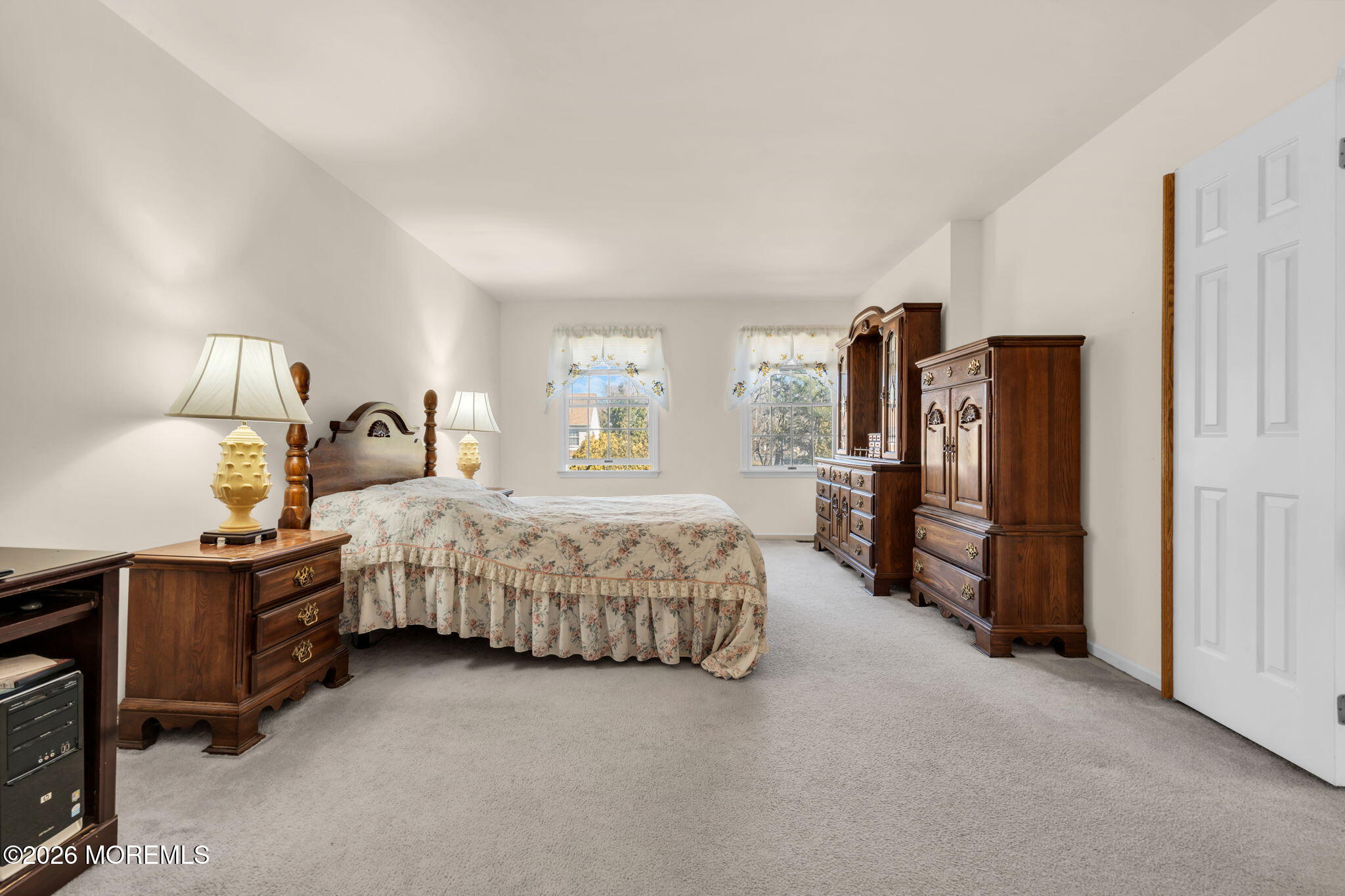 1 Wendy Court Jackson, NJ 08527 - Photo 22 of 33 a spacious bedroom with a bed closet and a lamp