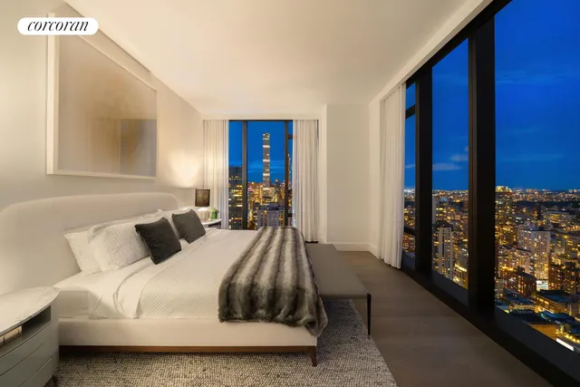 a kitchen that has a lot of cabinets in it and appliances