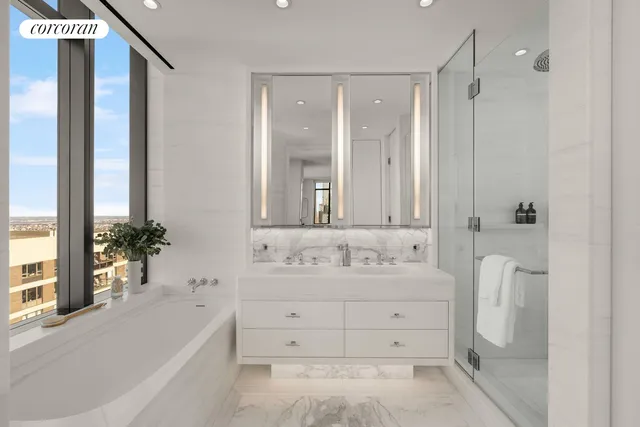 a bedroom with a bed and walk in closet