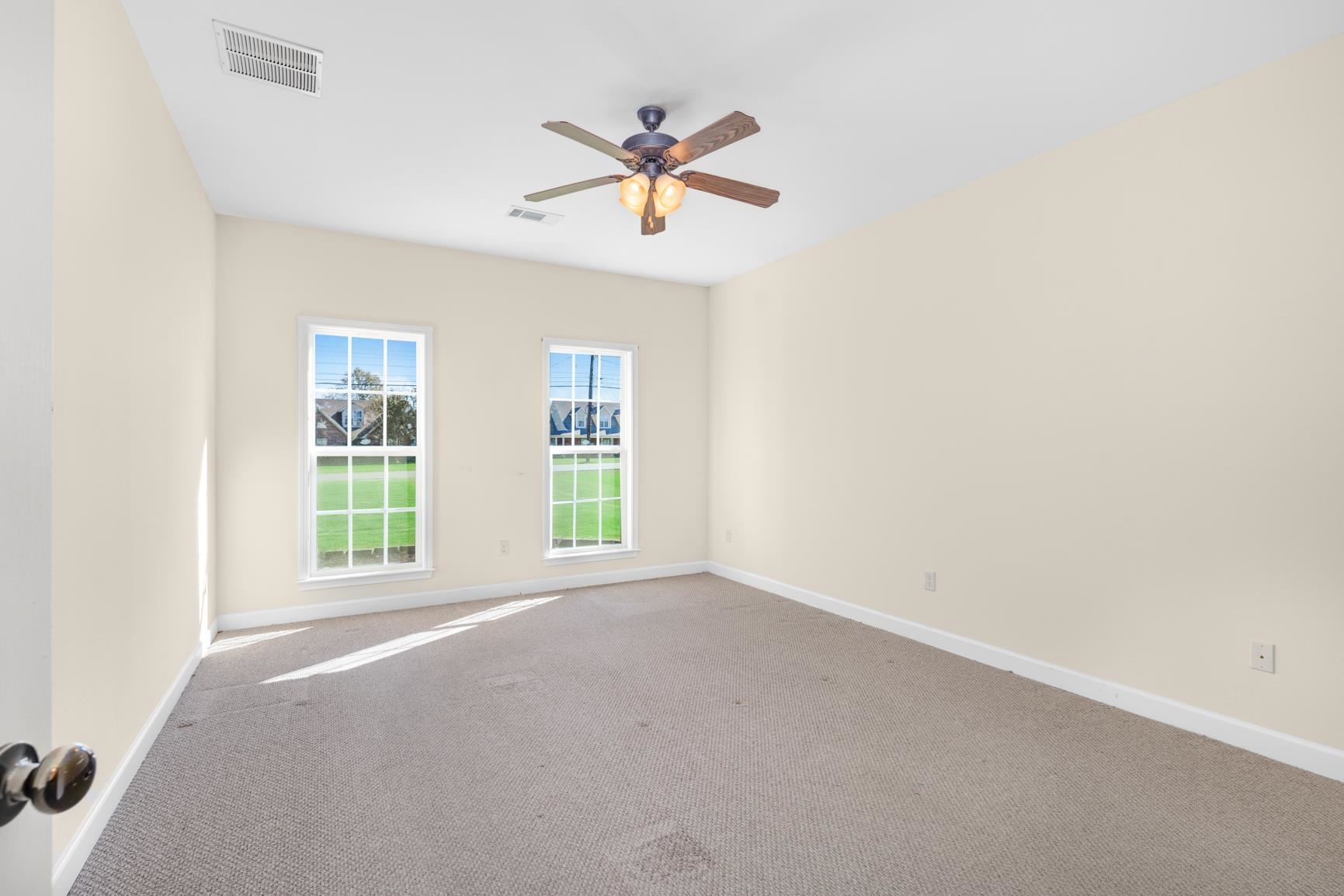 251 Rosemark Road Atoka, TN 38004 - Photo 20 of 40 Primary bedroom is downstairs facing the front of the home.