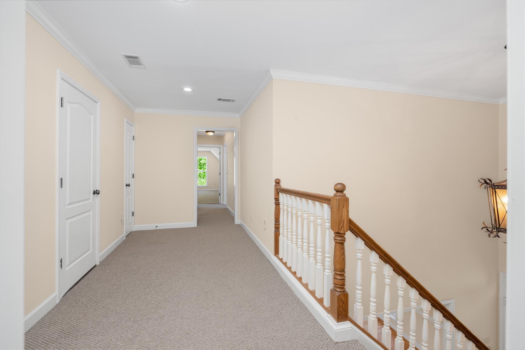 251 Rosemark Road Atoka, TN 38004 - Photo 24 of 40 Hall featuring crown molding and light colored carpet