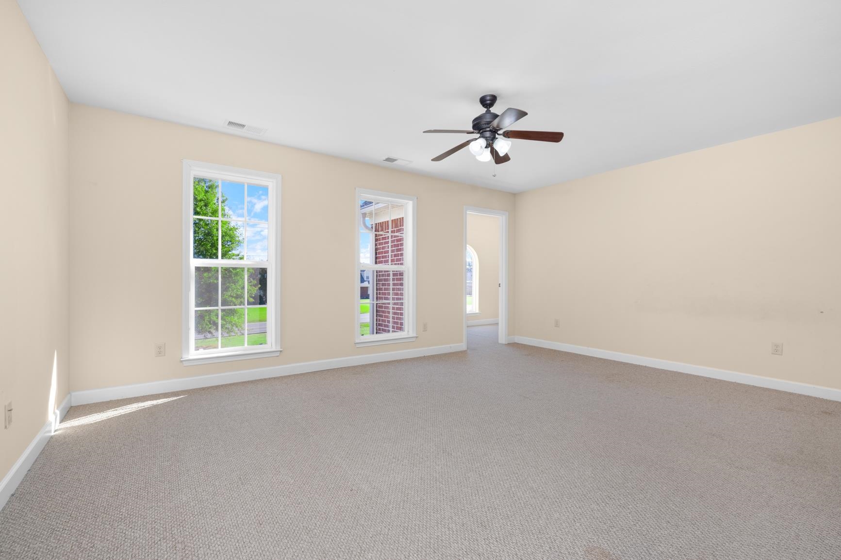251 Rosemark Road Atoka, TN 38004 - Photo 31 of 40 Large bedroom featuring a walk-in closet with a window