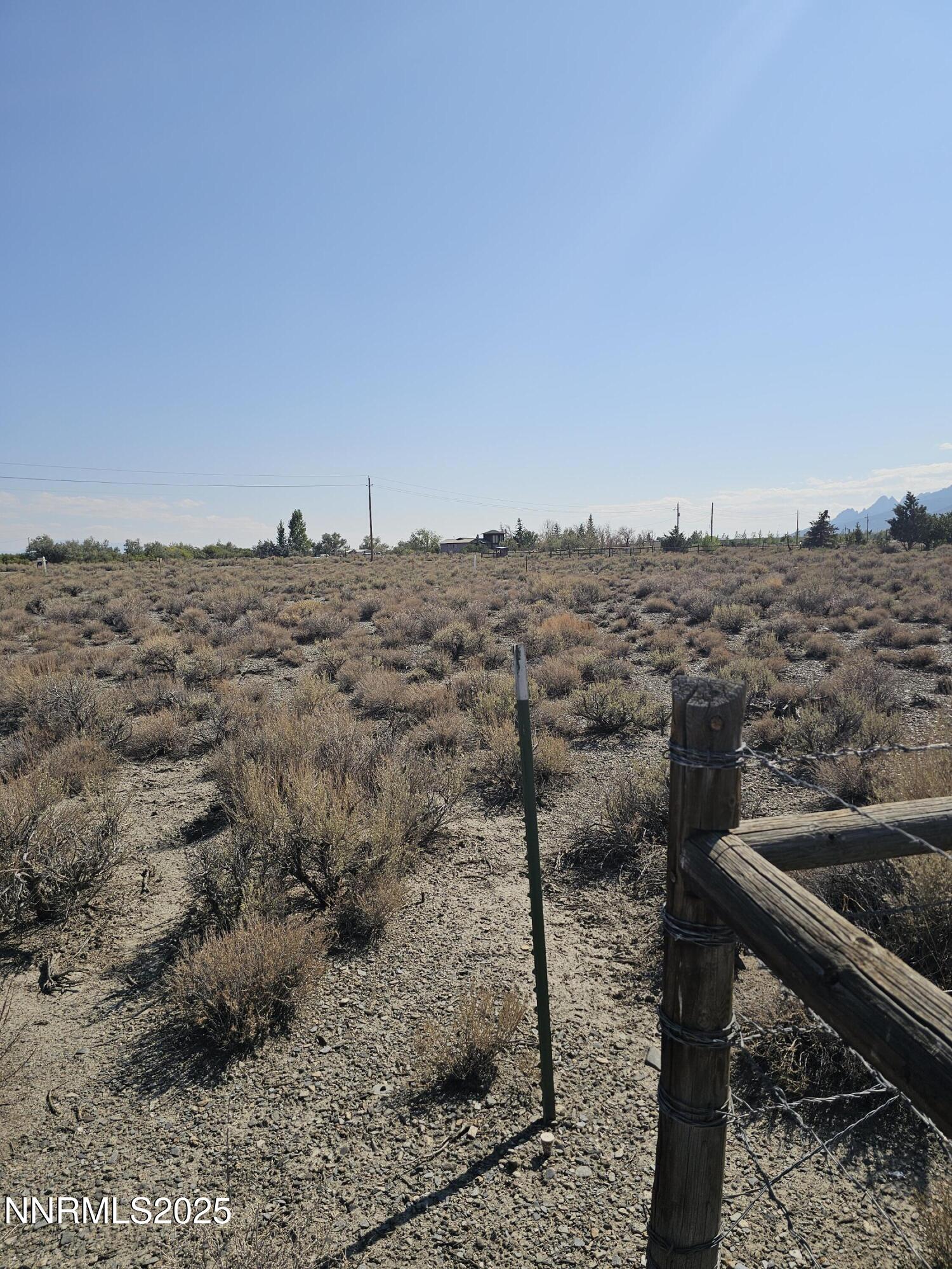 224 Toiyabe Road Austin, NV 89310 - Photo 6 of 13 a view of a dry yard with wooden fence