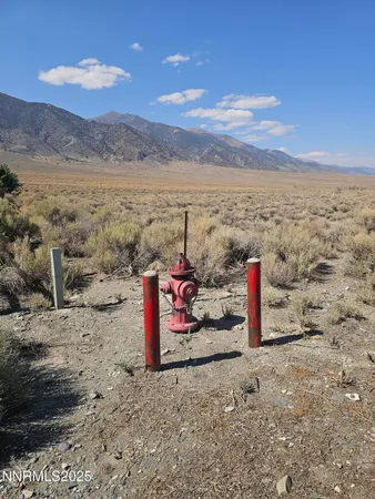 a view of a road with a mountain in the background