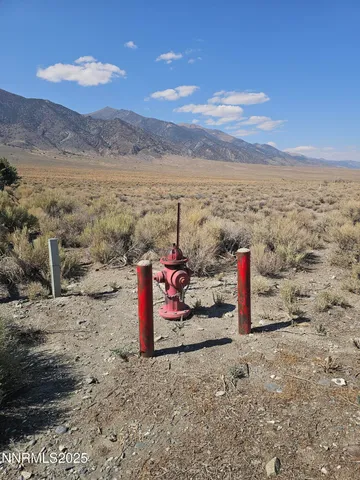 a view of a road with a mountain in the background