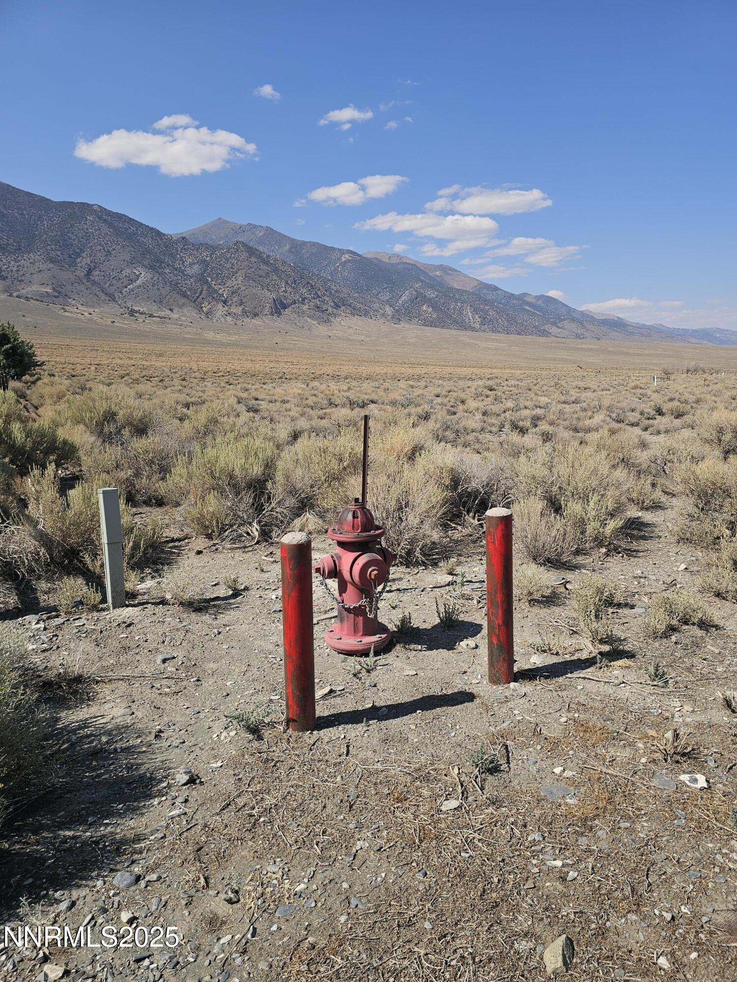 224 Toiyabe Road Austin, NV 89310 - Photo 8 of 13 a view of a road with a mountain in the background