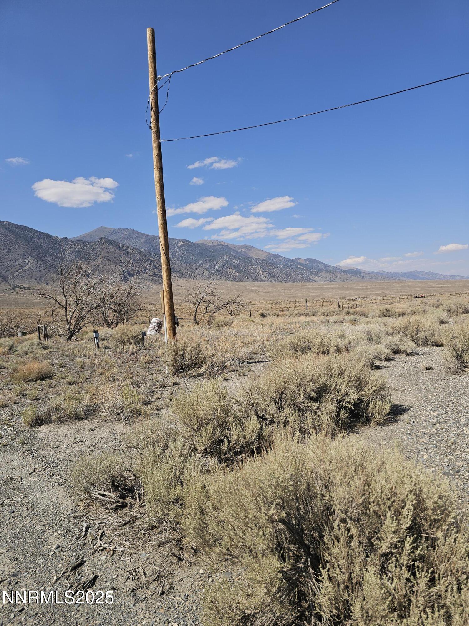 224 Toiyabe Road Austin, NV 89310 - Photo 9 of 13 a view of a dry yard with wooden fence