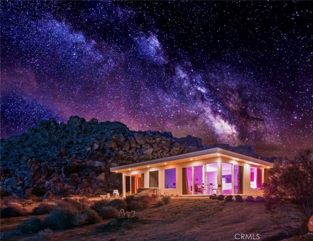63126 Rocking Chair Road Joshua Tree, CA 92252 - Photo 1 of 1 a view of house with yard and green space