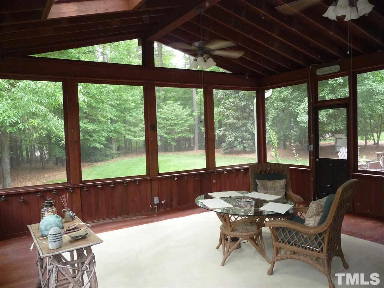 4733 Sharpstone Lane Raleigh, NC 27615 - Photo 11 of 23 a dining room with furniture and a large window
