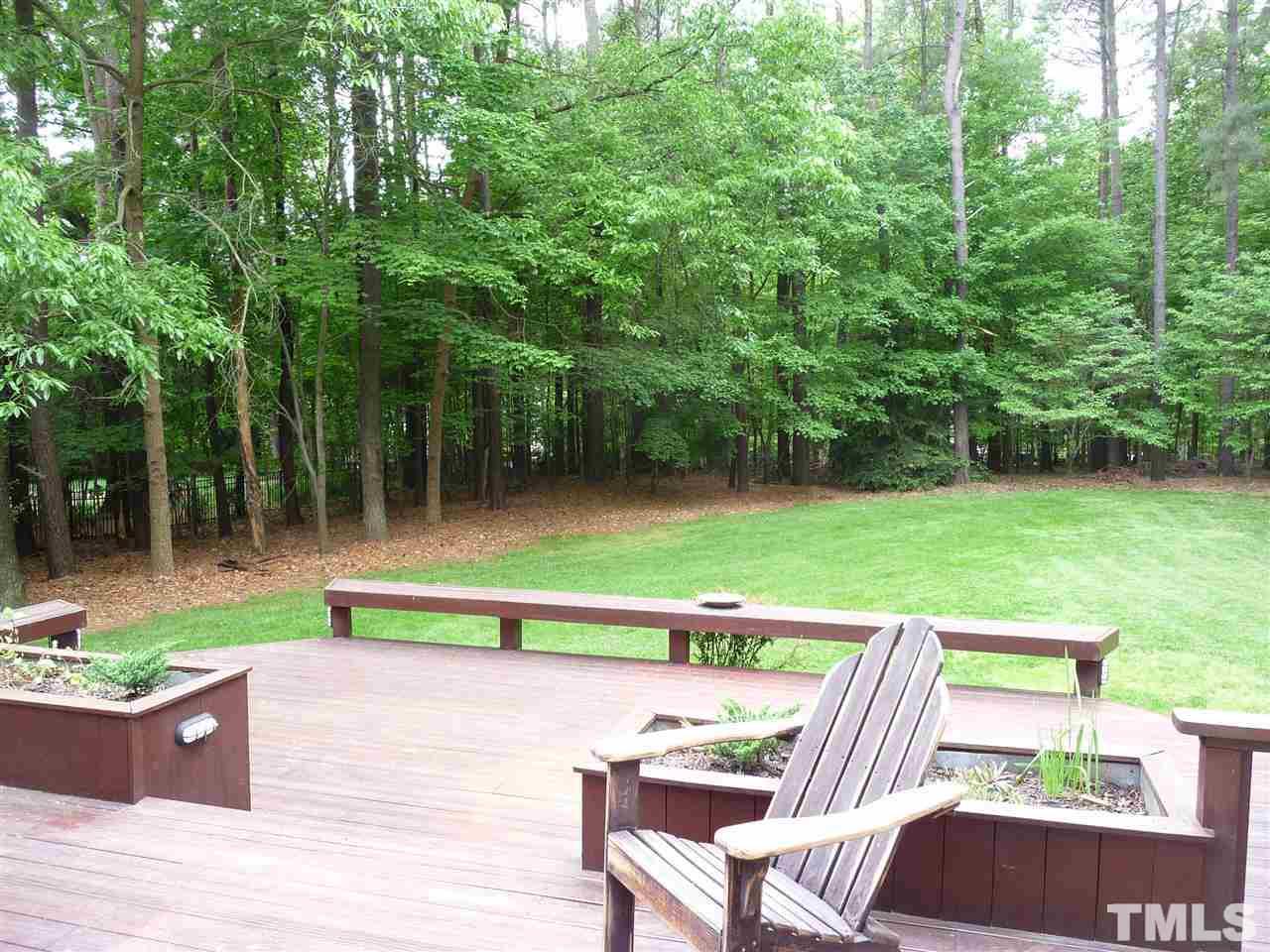 4733 Sharpstone Lane Raleigh, NC 27615 - Photo 15 of 23 a view of a chair and tables