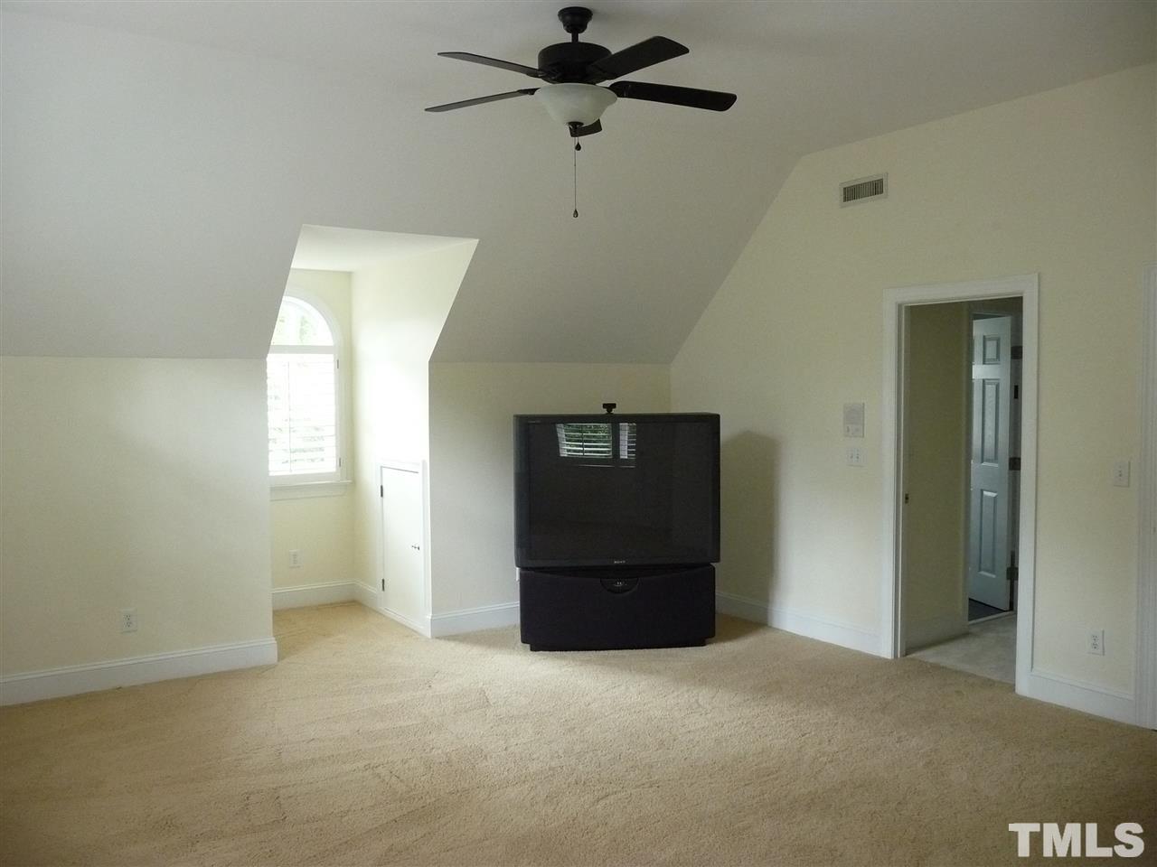 4733 Sharpstone Lane Raleigh, NC 27615 - Photo 18 of 23 a view of a livingroom with a closet