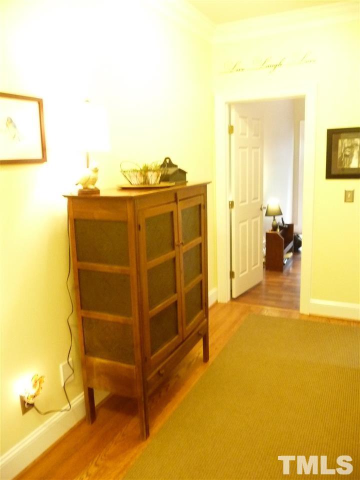 4733 Sharpstone Lane Raleigh, NC 27615 - Photo 20 of 23 a view of a room with wooden floor