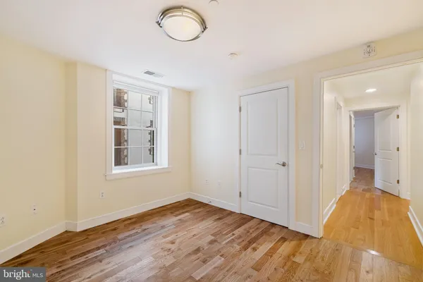 a view of livingroom with hardwood floor and window