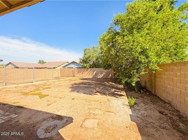 a view of beach with an ocean
