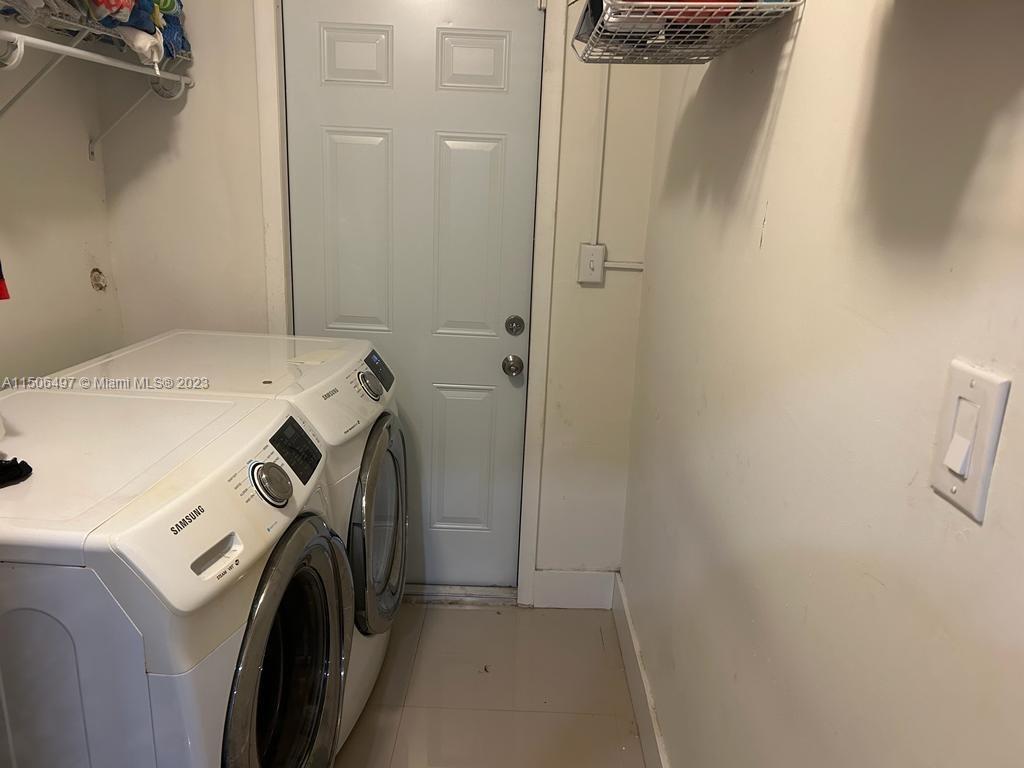 Coral Gate Miami, FL 33145 - Photo 6 of 13 a utility room with dryer and washer