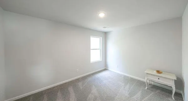 a view of a room with white walls