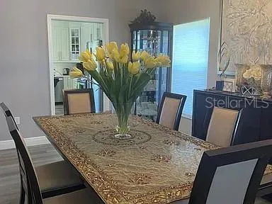 a view of a dining room with furniture