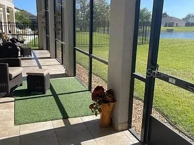 a view of a lake with houses in the background