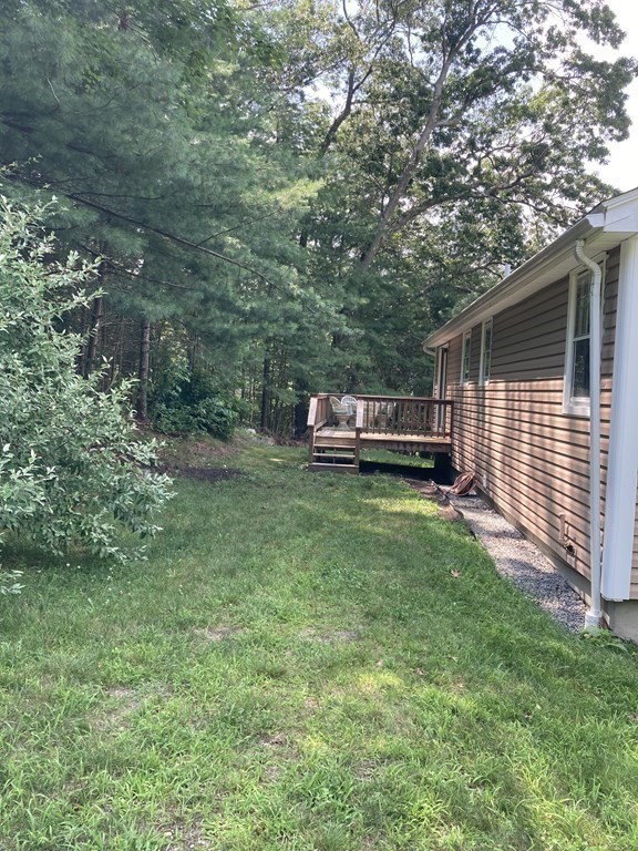 190 Fox Hill Road Burlington, MA 01803 - Photo 12 of 13 a front view of a house with a garden