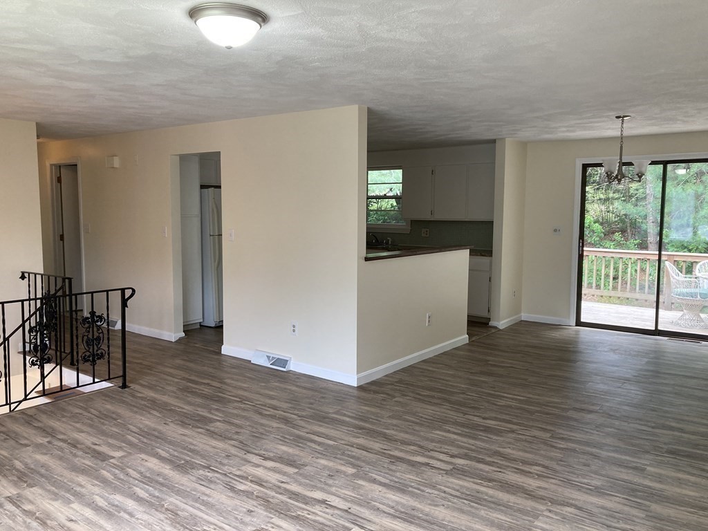 190 Fox Hill Road Burlington, MA 01803 - Photo 5 of 13 a view of kitchen with furniture and wooden floor
