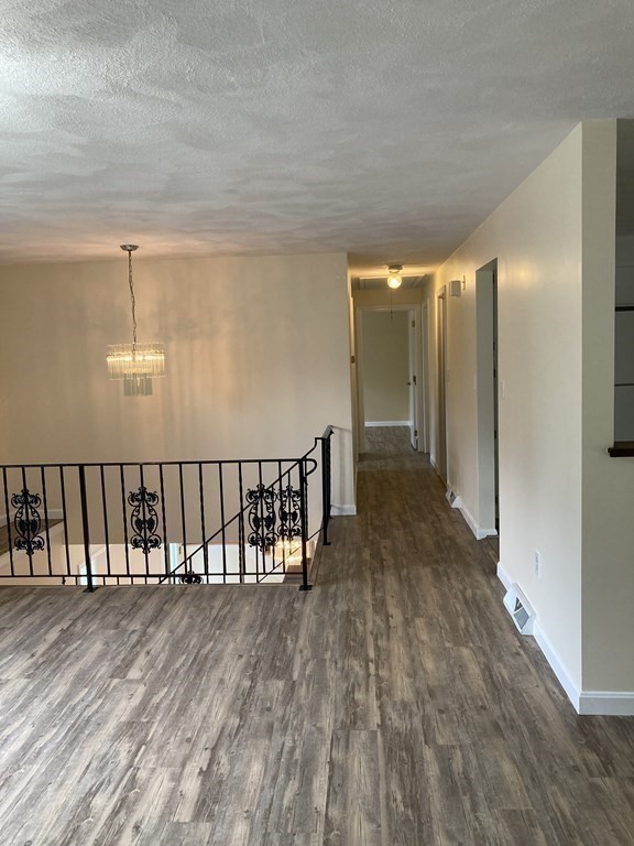 190 Fox Hill Road Burlington, MA 01803 - Photo 9 of 13 a view of hallway with wooden floor