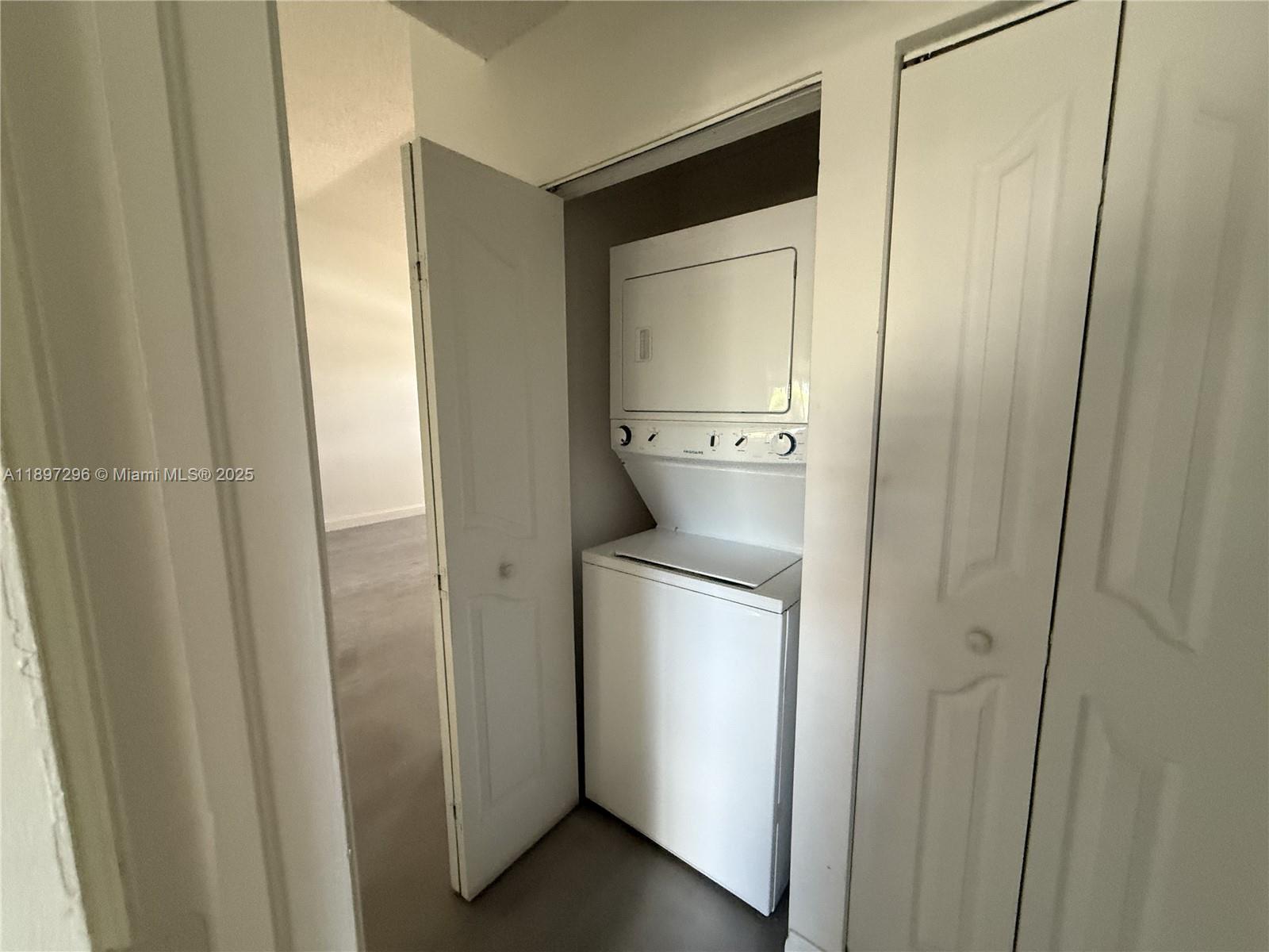 18942 Northwest 86th Court, Unit 4106 Hialeah, FL 33015 - Photo 10 of 10 a room with storage and utility