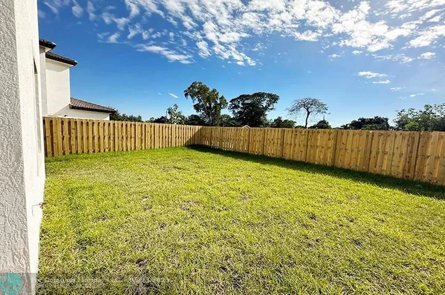 a view of a backyard with a garden