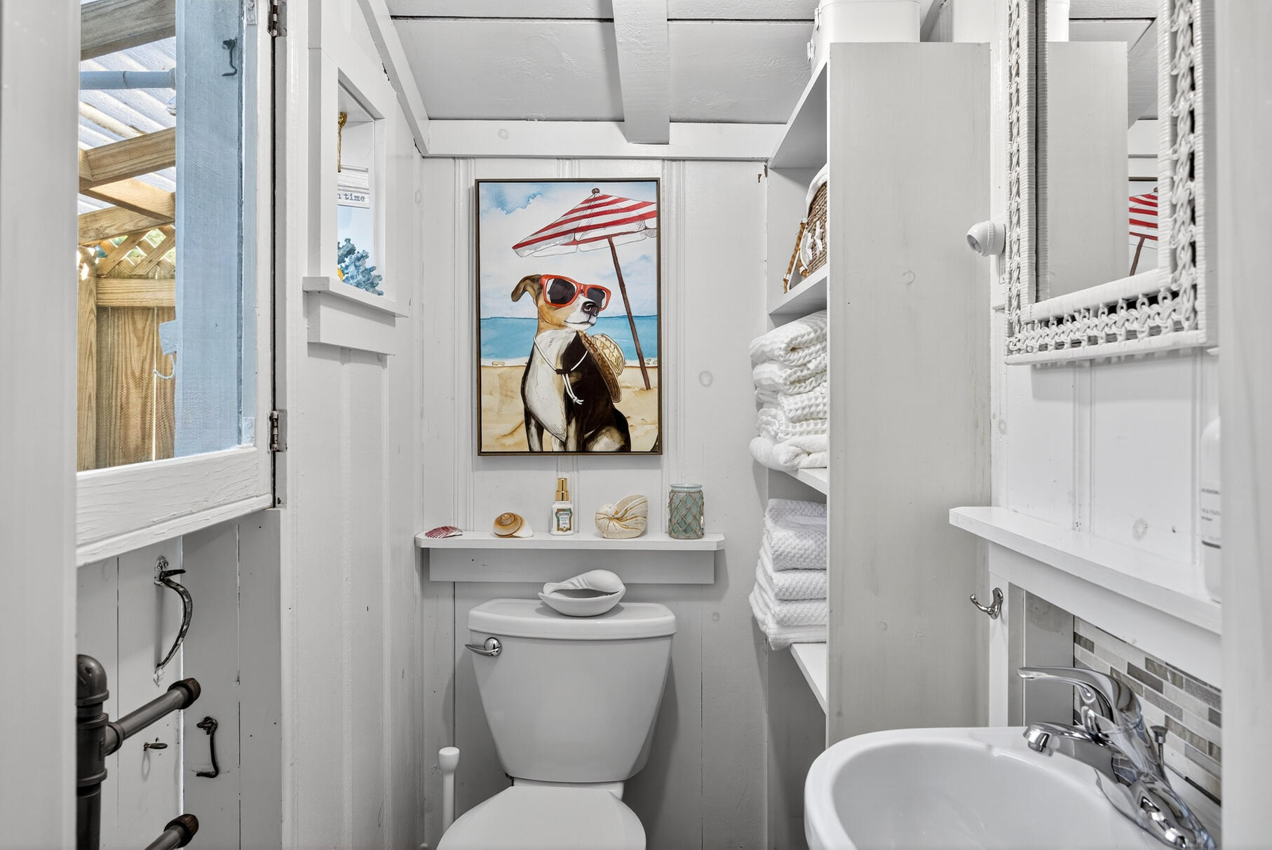 262 Old Wharf Road, Unit U27 Dennis Port, MA 02639 - Photo 15 of 37 a bathroom with a toilet sink and mirror