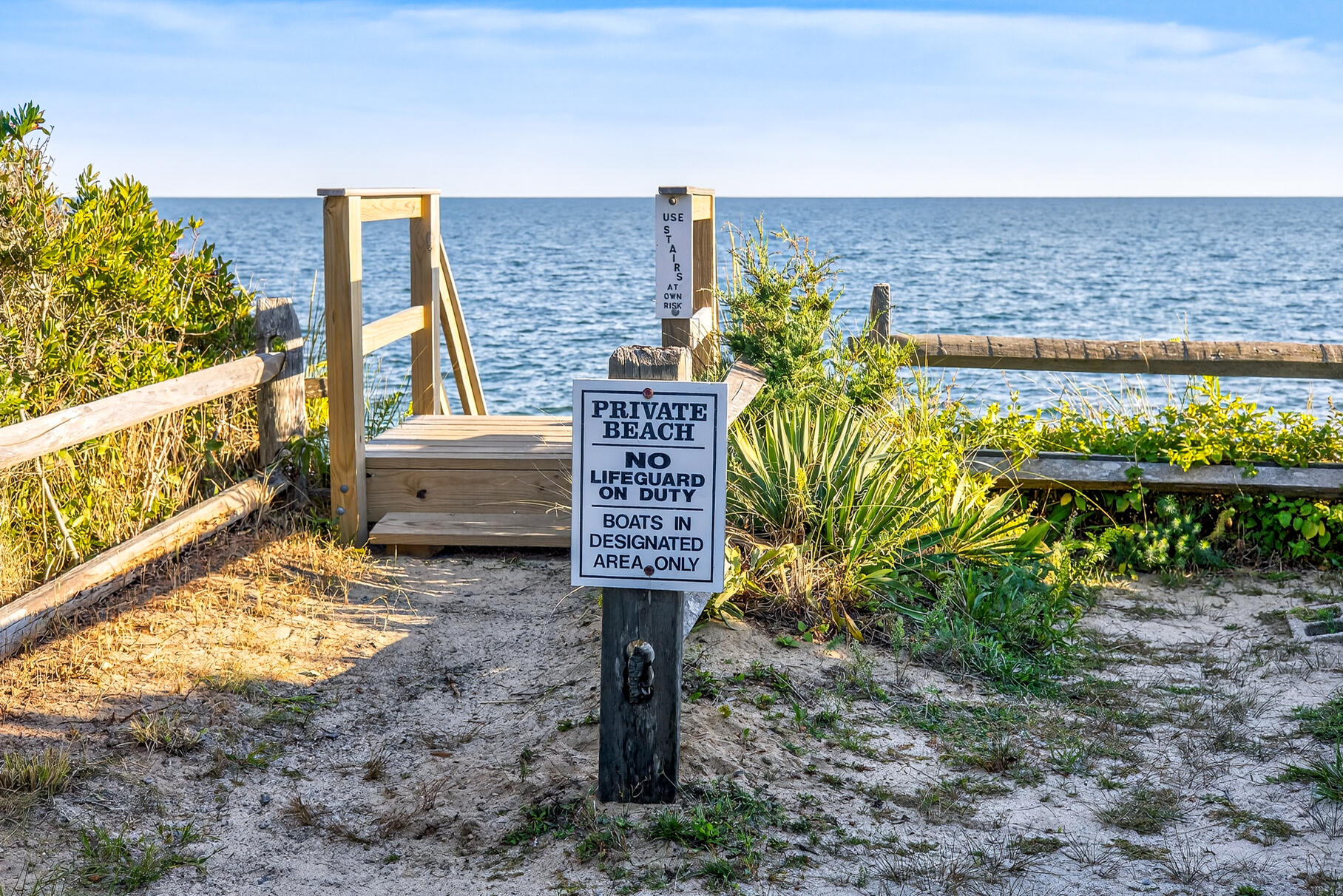 262 Old Wharf Road, Unit U27 Dennis Port, MA 02639 - Photo 20 of 37 a view of a terrace with a garden