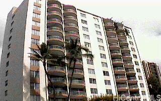 1018 Lunalilo Street, Unit 1004 Honolulu, HI 96822 - Photo 1 of 1 a front view of a tall building