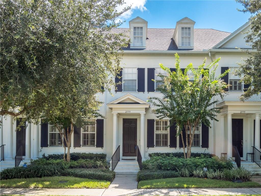 2779 Upper Park Road Orlando, FL 32814 - Photo 1 of 1 front view of a brick house with a yard